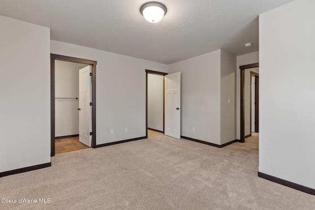 1201 E Locust Ave, Coeur Dalene, ID 83814 - unfurnished bedroom featuring carpet and baseboards