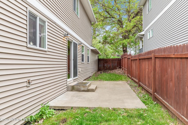 1201 E Locust Ave, Coeur Dalene, ID 83814 - fenced backyard featuring a patio area