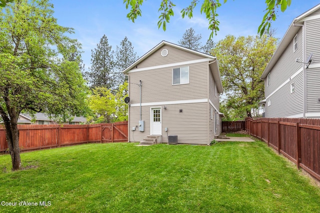 1201 E Locust Ave, Coeur Dalene, ID 83814 - back of property with entry steps and central AC