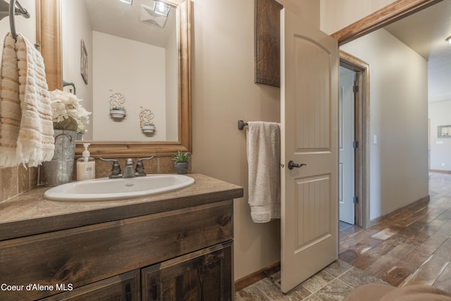 bathroom featuring vanity and wood finished floors
