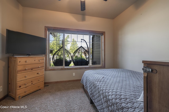 bedroom featuring carpet, baseboards, and ceiling fan