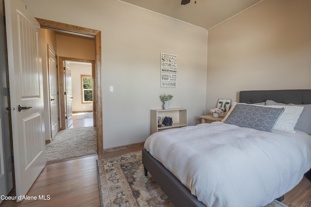 bedroom with wood finished floors