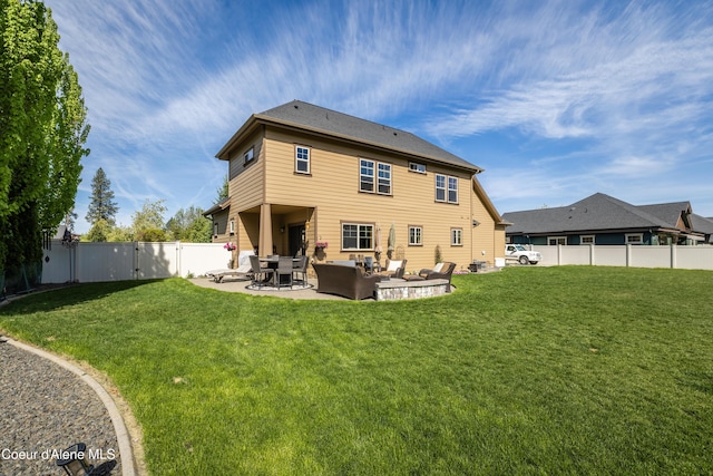 rear view of property with an outdoor hangout area, a patio area, and a gate