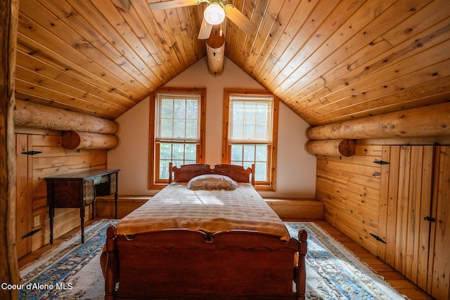bedroom with log walls, wooden ceiling, light wood-style floors, lofted ceiling, and ceiling fan