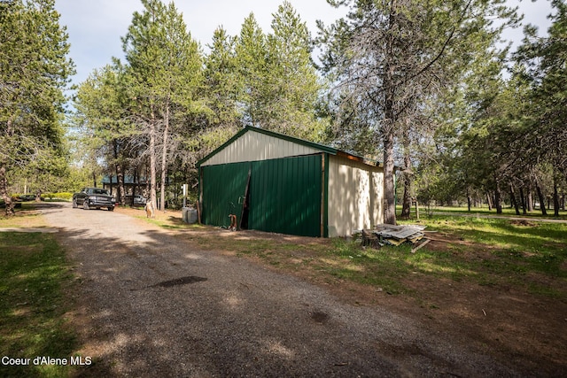 view of outbuilding with an outbuilding and view of scattered trees