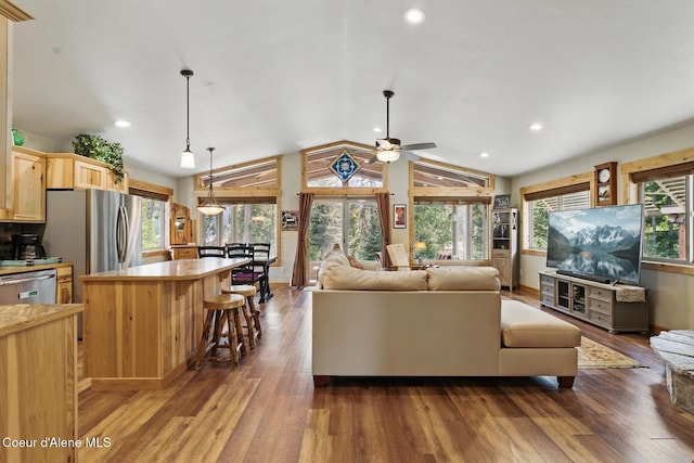 304 Hagman Rd, Nordman, ID 83848 - living area with wood finished floors, a ceiling fan, vaulted ceiling, recessed lighting, and baseboards