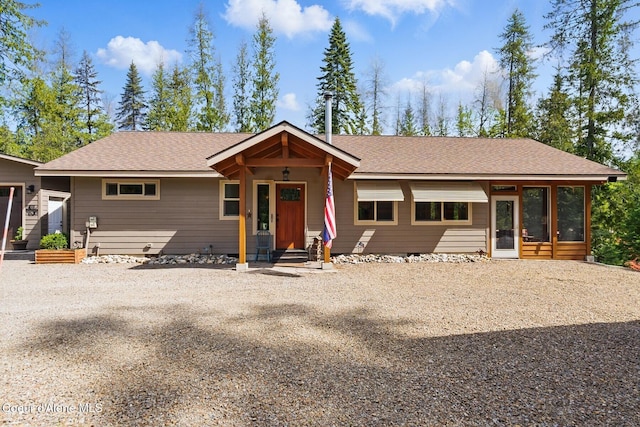 304 Hagman Rd, Nordman, ID 83848 - view of front of house featuring entry steps and a sunroom