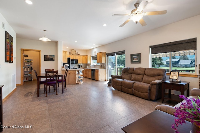108 Ironwood Dr, Blanchard, ID 83804 - tiled living room featuring a ceiling fan and recessed lighting