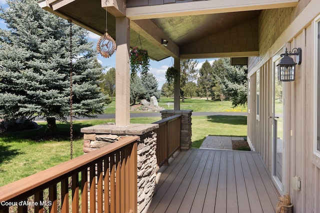 108 Ironwood Dr, Blanchard, ID 83804 - wooden deck with a lawn and a porch