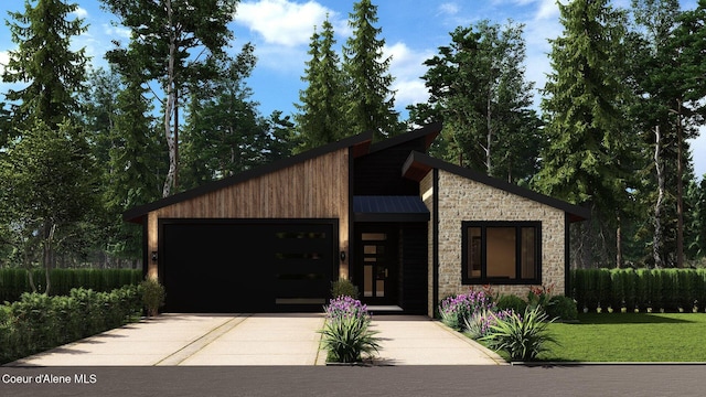 view of front facade with stone siding, driveway, an attached garage, metal roof, and a standing seam roof