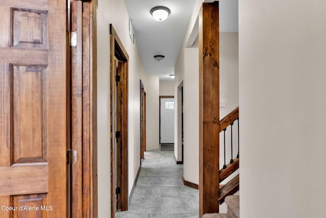 12251 W Blessing Hill Rd, Post Falls, ID 83854 - hallway featuring stairway and baseboards