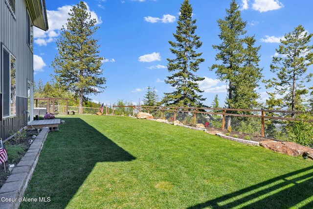 12251 W Blessing Hill Rd, Post Falls, ID 83854 - view of yard with a deck