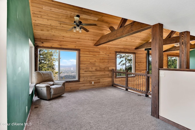 12251 W Blessing Hill Rd, Post Falls, ID 83854 - unfurnished room with carpet flooring, wood walls, ceiling fan, and wood ceiling