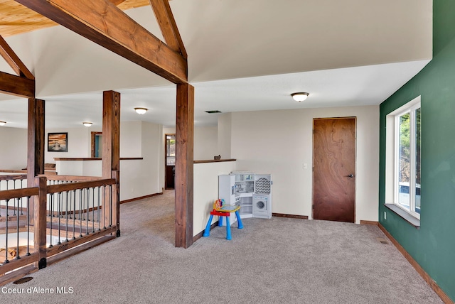12251 W Blessing Hill Rd, Post Falls, ID 83854 - rec room with carpet flooring, vaulted ceiling, and baseboards