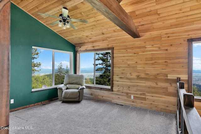 12251 W Blessing Hill Rd, Post Falls, ID 83854 - sitting room with wooden ceiling, healthy amount of natural light, vaulted ceiling, ceiling fan, and carpet flooring