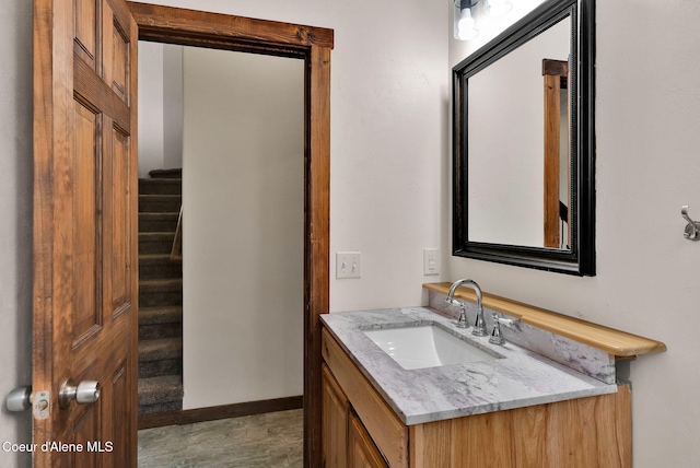 12251 W Blessing Hill Rd, Post Falls, ID 83854 - bathroom with vanity and baseboards