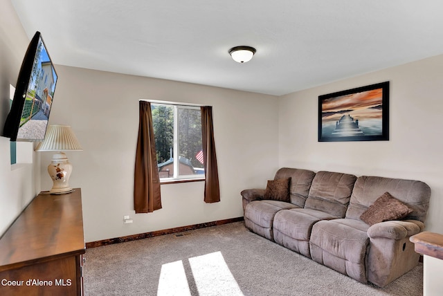 12251 W Blessing Hill Rd, Post Falls, ID 83854 - living room featuring carpet and baseboards
