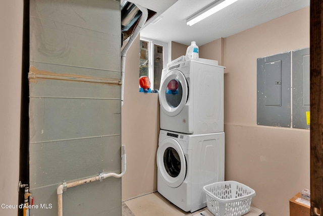 12251 W Blessing Hill Rd, Post Falls, ID 83854 - washroom with estacked washer and dryer and electric panel