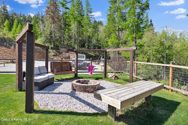 12251 W Blessing Hill Rd, Post Falls, ID 83854 - view of home's community with an outdoor fire pit