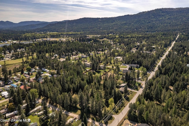 249 Gun Club Rd, Sagle, ID 83860 - aerial overview of property's location featuring a mountain backdrop and a forest