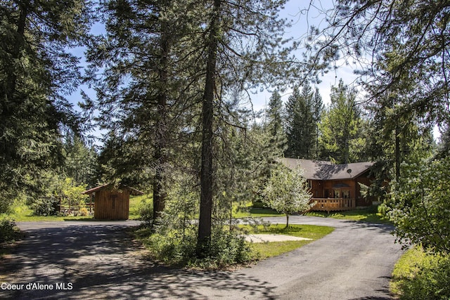 249 Gun Club Rd, Sagle, ID 83860 - view of front of home featuring driveway and an outbuilding