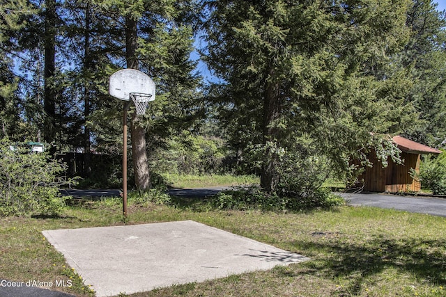 249 Gun Club Rd, Sagle, ID 83860 - view of basketball court with a lawn