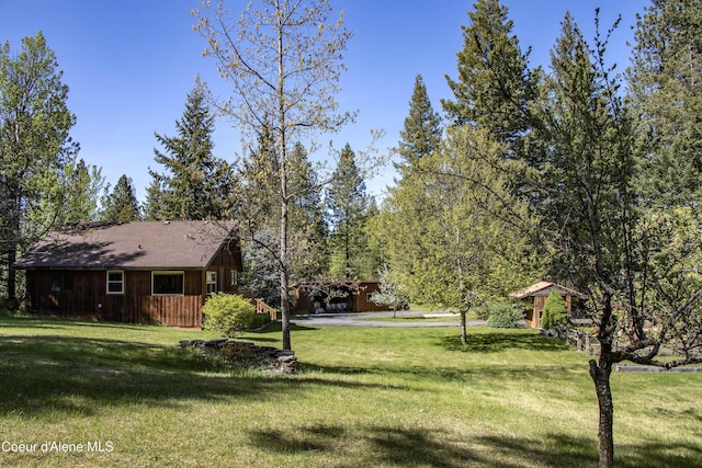 249 Gun Club Rd, Sagle, ID 83860 - view of grassy yard with a carport