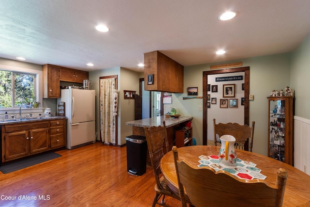 249 Gun Club Rd, Sagle, ID 83860 - dining area with light wood-style floors and recessed lighting
