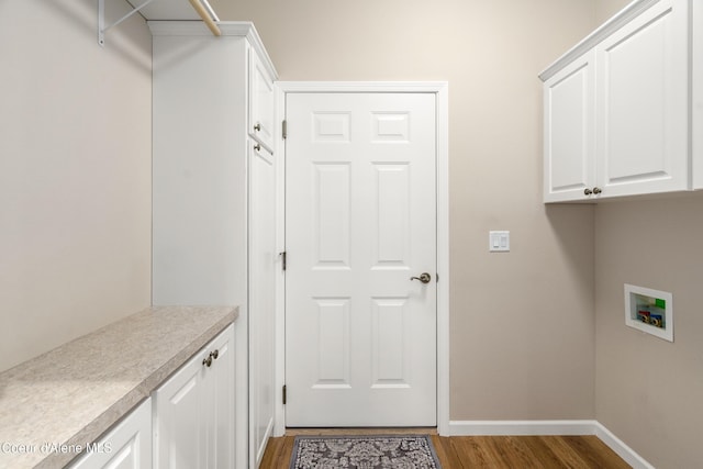 3253 W Magistrate Loop, Hayden, ID 83835 - laundry room with cabinet space, wood finished floors, hookup for a washing machine, and baseboards