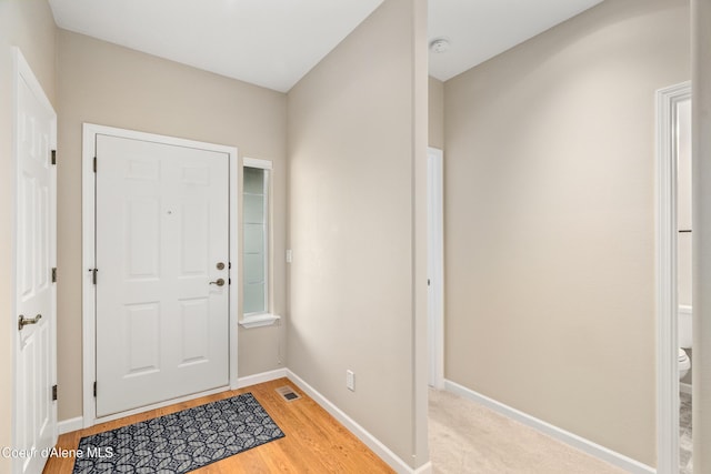 3253 W Magistrate Loop, Hayden, ID 83835 - entrance foyer featuring light wood finished floors and baseboards