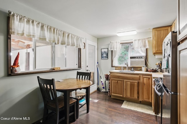 306 Eastside Rd, Priest River, ID 83856 - kitchen with a sink, dark wood-type flooring, light countertops, and brown cabinets