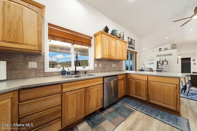 4411 N Campbell Rd, Otis Orchards, WA 99027 - kitchen featuring dishwasher, a sink, dark wood finished floors, light countertops, and vaulted ceiling