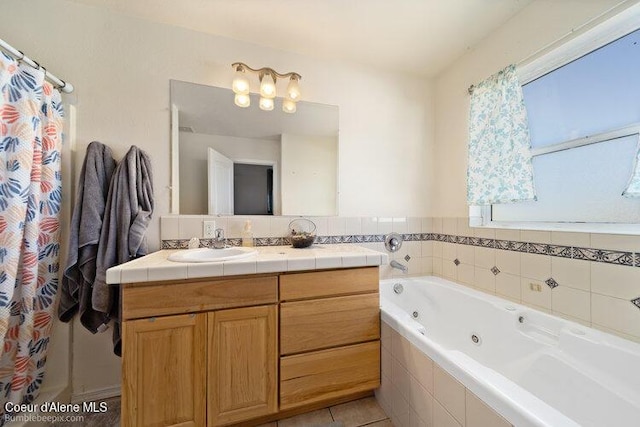 4411 N Campbell Rd, Otis Orchards, WA 99027 - full bath with vanity, a jetted tub, and tile patterned flooring