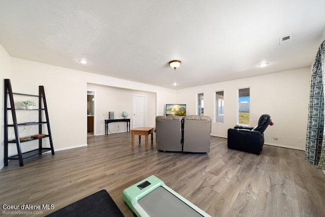 4411 N Campbell Rd, Otis Orchards, WA 99027 - living room featuring wood finished floors, baseboards, and recessed lighting
