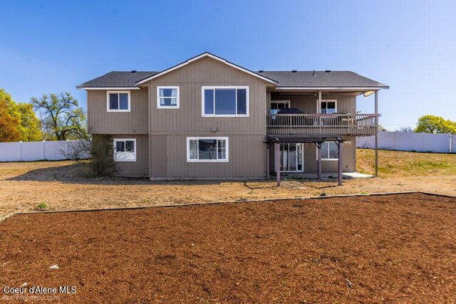 4411 N Campbell Rd, Otis Orchards, WA 99027 - rear view of property featuring a fenced backyard and a wooden deck