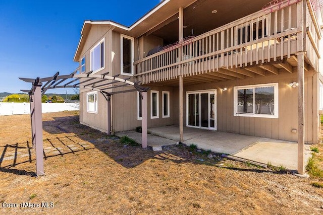 4411 N Campbell Rd, Otis Orchards, WA 99027 - rear view of house featuring a pergola, a patio, and a balcony