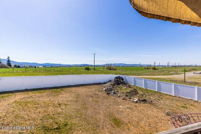 4411 N Campbell Rd, Otis Orchards, WA 99027 - view of yard with fence, a mountain view, and a rural view