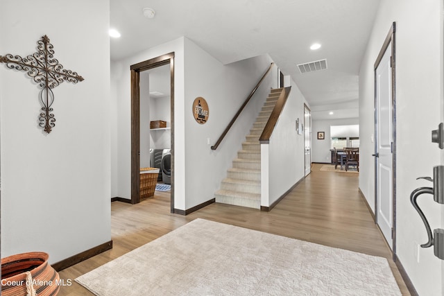 3172 N Cyprus Fox Loop, Post Falls, ID 83854 - entryway featuring stairway, light wood-type flooring, and baseboards