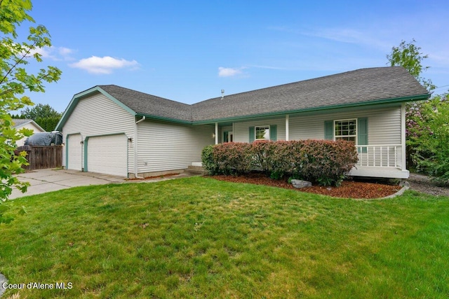 1100 E Autumn Crest Loop, Post Falls, ID 83854 - ranch-style house with an attached garage and driveway