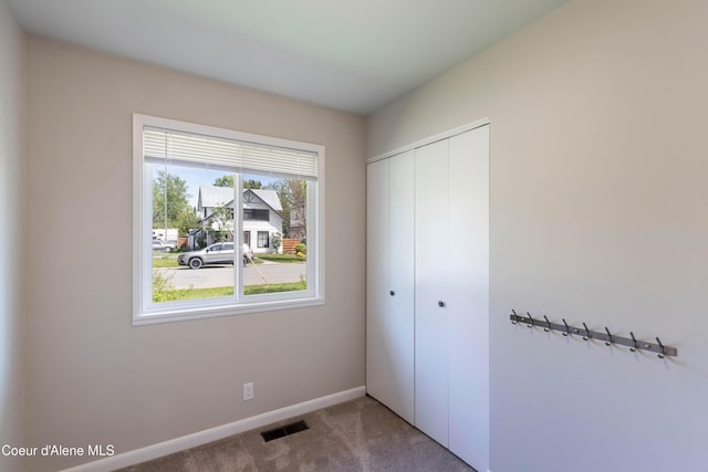 1223 W Superior, Sandpoint, ID 83864 - unfurnished bedroom featuring a closet, carpet flooring, and baseboards