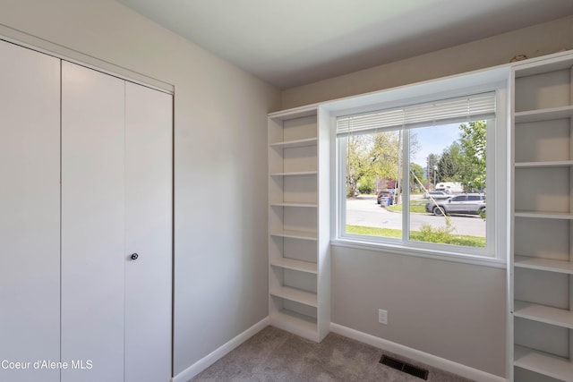 1223 W Superior, Sandpoint, ID 83864 - unfurnished bedroom with carpet flooring, baseboards, and a closet