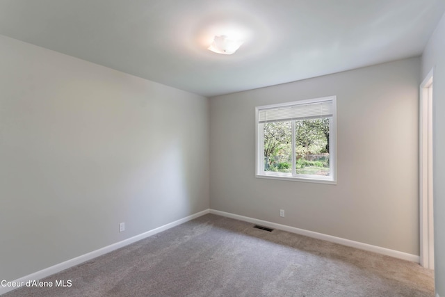 1223 W Superior, Sandpoint, ID 83864 - spare room featuring carpet flooring and baseboards