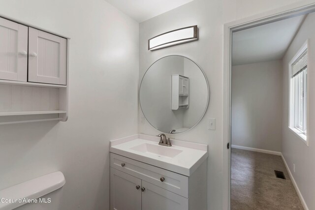 1223 W Superior, Sandpoint, ID 83864 - bathroom with vanity, baseboards, and toilet