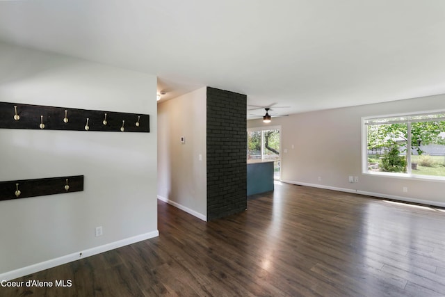 1223 W Superior, Sandpoint, ID 83864 - unfurnished room featuring dark wood-style floors, baseboards, and ceiling fan