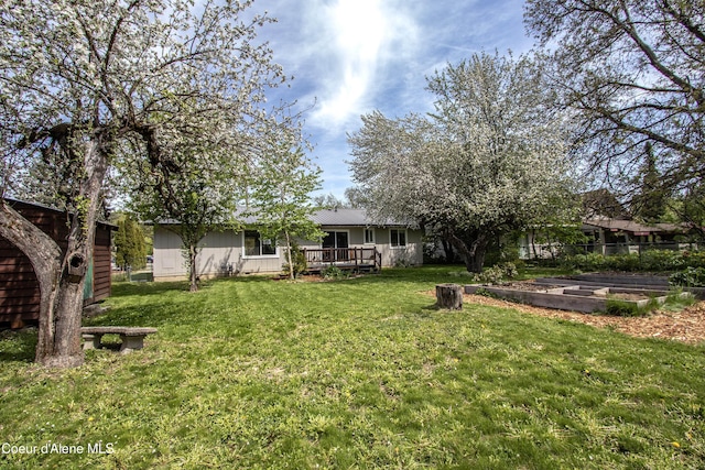 1223 W Superior, Sandpoint, ID 83864 - view of yard with a garden and a wooden deck