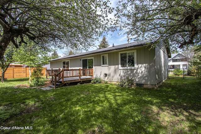 1223 W Superior, Sandpoint, ID 83864 - rear view of house with a wooden deck and board and batten siding