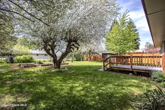 1223 W Superior, Sandpoint, ID 83864 - view of yard with a wooden deck and a garden