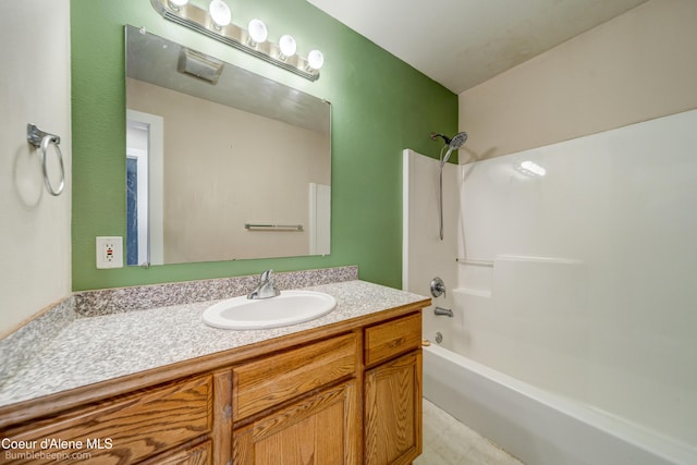 30603 N Riffle Rd, Spirit Lake, ID 83869 - bathroom featuring shower / bathtub combination and vanity