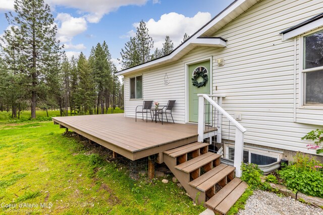 30603 N Riffle Rd, Spirit Lake, ID 83869 - wooden terrace featuring a lawn