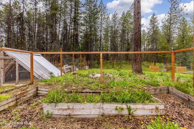 30603 N Riffle Rd, Spirit Lake, ID 83869 - view of yard featuring a garden